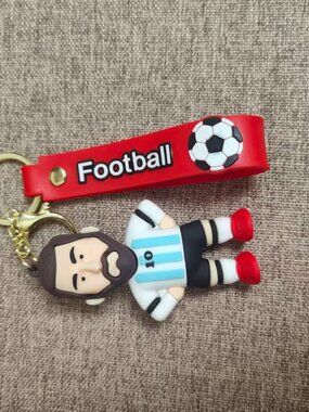 Rubber number 10 Messi shirt keychain.